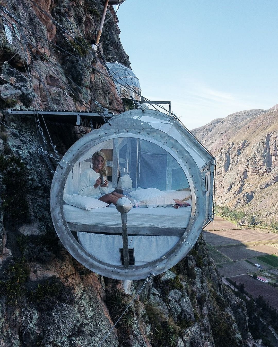 The rooms hang from a mountain top